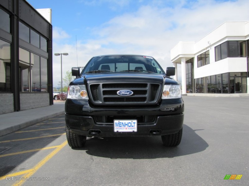 2004 F150 STX Regular Cab 4x4 - Black / Medium Graphite photo #27