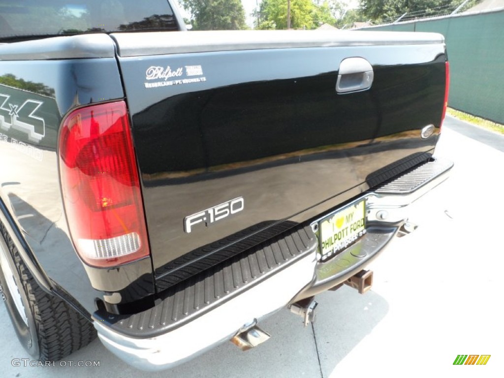 2000 F150 XLT Extended Cab 4x4 - Black / Dark Graphite photo #23