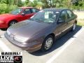 1999 Brown Saturn S Series SL2 Sedan  photo #3