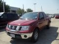 Red Brick 2010 Nissan Frontier SE King Cab