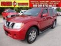 Red Brick 2009 Nissan Pathfinder SE
