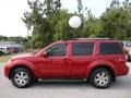 2009 Red Brick Nissan Pathfinder SE  photo #2