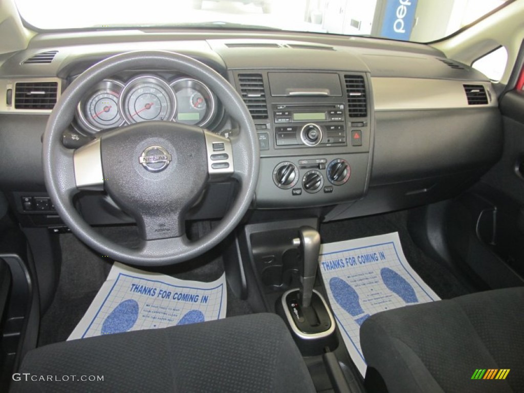 2010 Versa 1.8 S Sedan - Red Brick Metallic / Charcoal photo #12