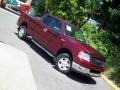 2004 Dark Toreador Red Metallic Ford F150 XLT SuperCab 4x4  photo #24