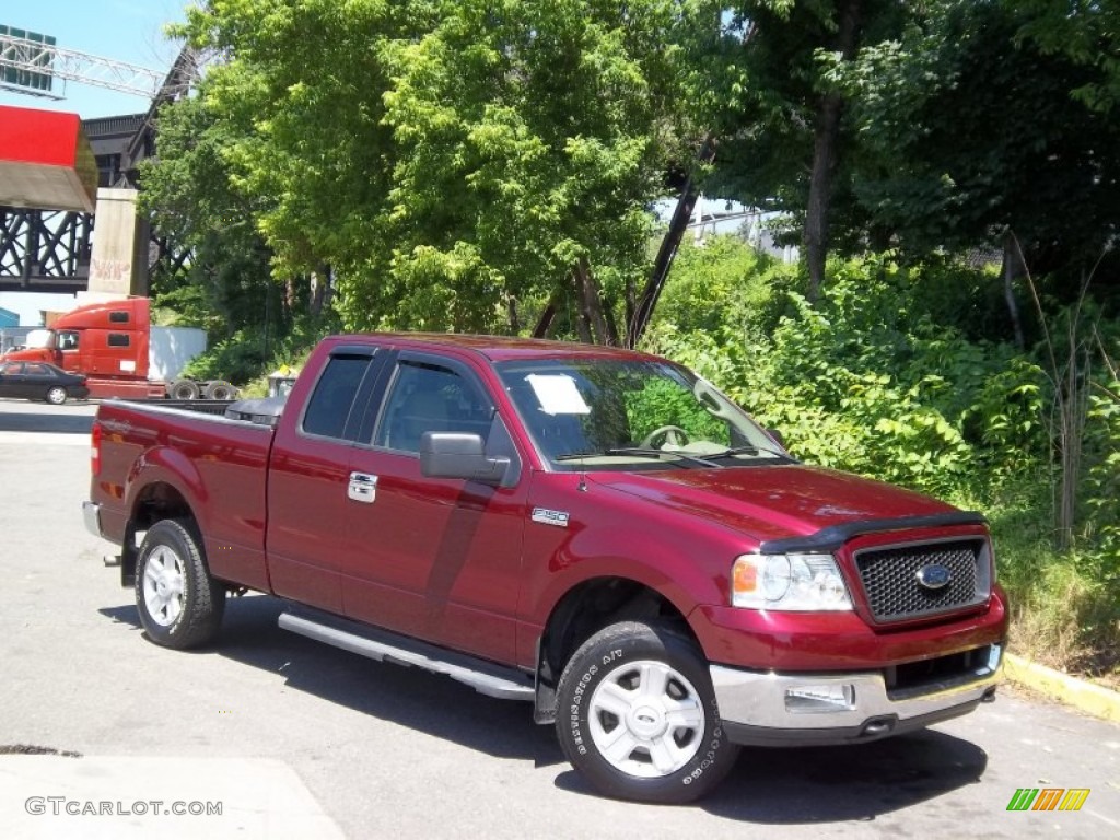 2004 F150 XLT SuperCab 4x4 - Dark Toreador Red Metallic / Tan photo #25