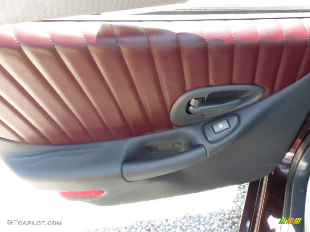 2002 Pontiac Grand Prix GT Sedan Ruby Red Door Panel Photo #50163503