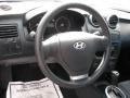 Black Steering Wheel Photo for 2005 Hyundai Tiburon #50178182