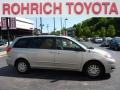 2010 Silver Shadow Pearl Toyota Sienna LE  photo #5