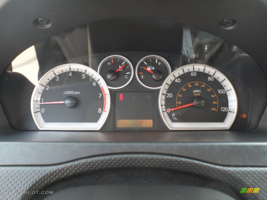 2011 Chevrolet Aveo LT Sedan Gauges Photo #50232862