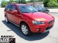 2010 Rally Red Metallic Mitsubishi Outlander SE 4WD  photo #7