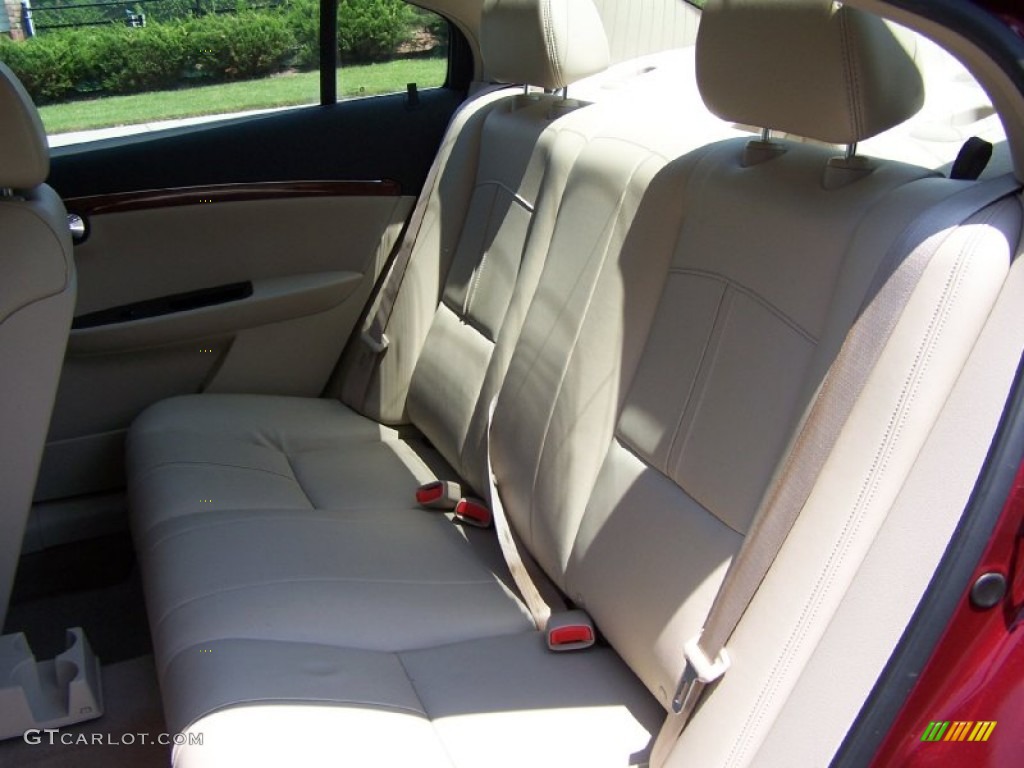 2009 Aura XR - Red Jewel Tintcoat / Tan photo #12