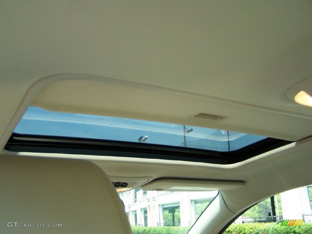 2009 Aura XR - Red Jewel Tintcoat / Tan photo #13