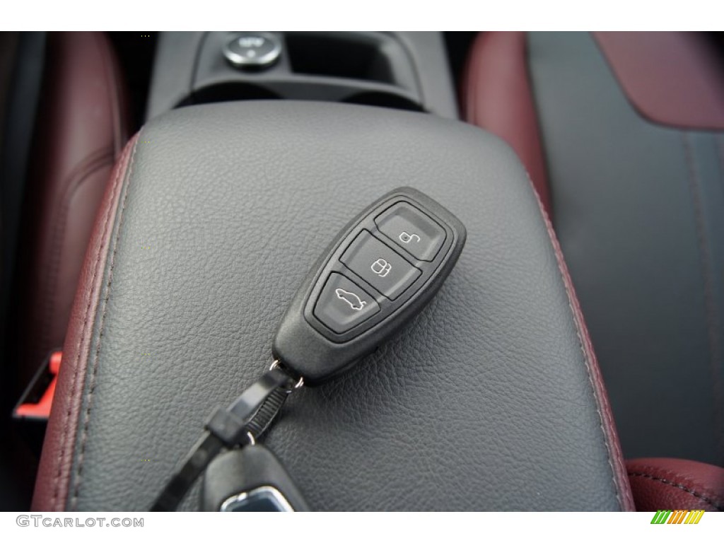 2012 Focus Titanium Sedan - Tuxedo Black Metallic / Tuscany Red Leather photo #40