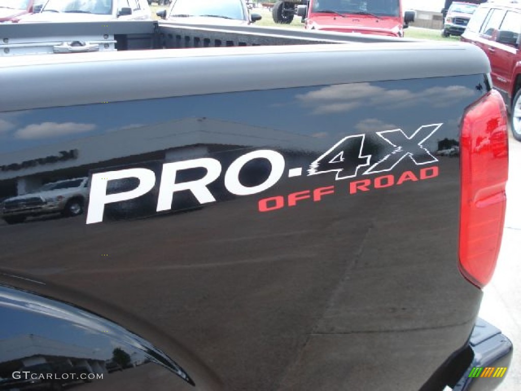 2010 Frontier Pro-4X Crew Cab 4x4 - Super Black / Pro-4X Charcoal photo #35