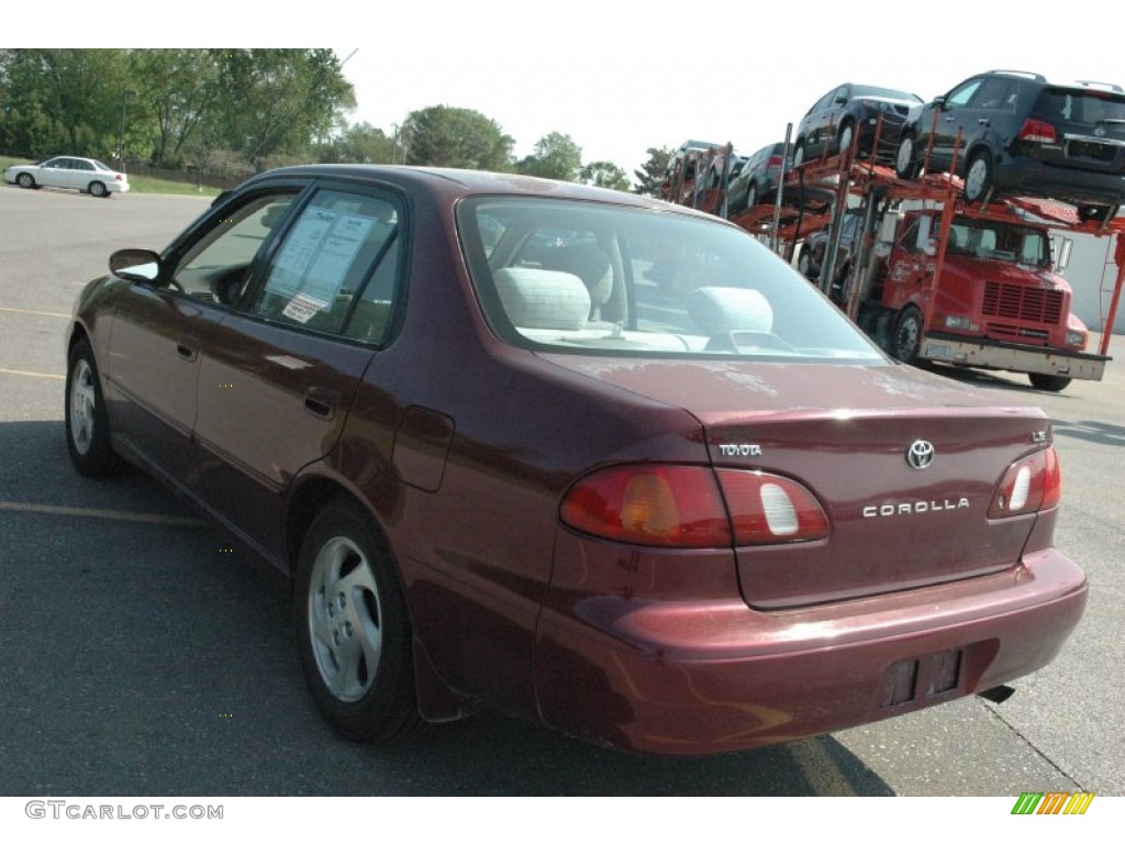1998 Corolla LE - Ruby Red Pearl Metallic / Beige photo #4