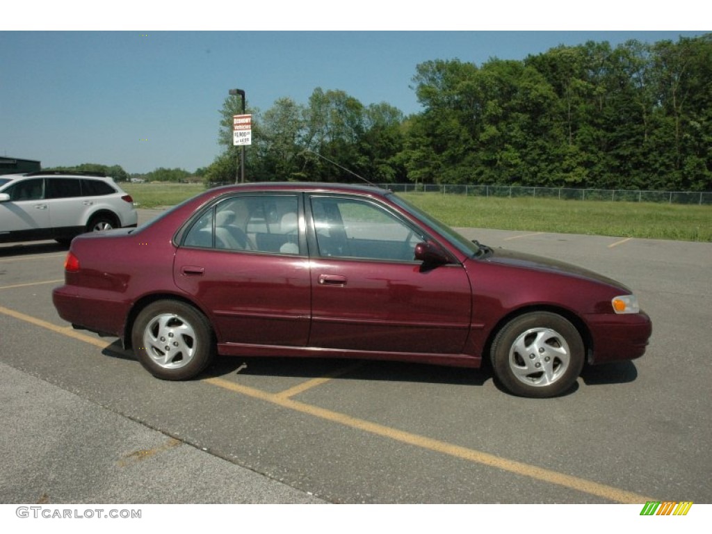 1998 Corolla LE - Ruby Red Pearl Metallic / Beige photo #11