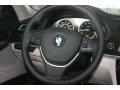 Oyster/Black Steering Wheel Photo for 2012 BMW 7 Series #50275713