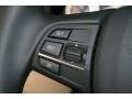 Oyster/Black Controls Photo for 2012 BMW 7 Series #50275854