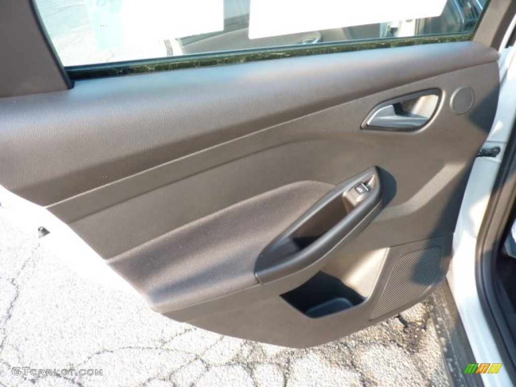 2012 Ford Focus Titanium Sedan Charcoal Black Leather Door Panel Photo #50277657
