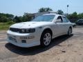 Arctic White Pearl Metallic 1998 Nissan Maxima GXE
