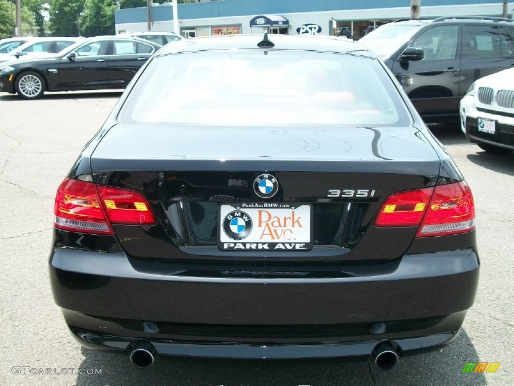 2010 3 Series 335i xDrive Coupe - Jet Black / Coral Red/Black Dakota Leather photo #6