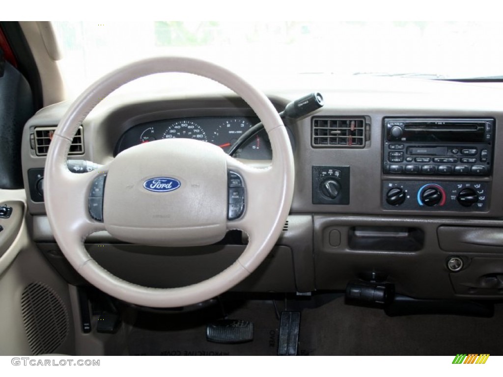 2003 F350 Super Duty Lariat Crew Cab 4x4 Dually - Toreador Red Metallic / Medium Parchment photo #65