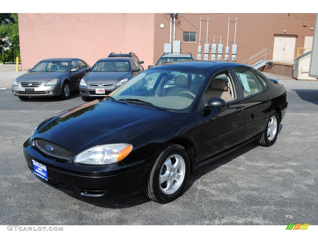 Black 2004 Ford Taurus SES Sedan Exterior Photo #50341157