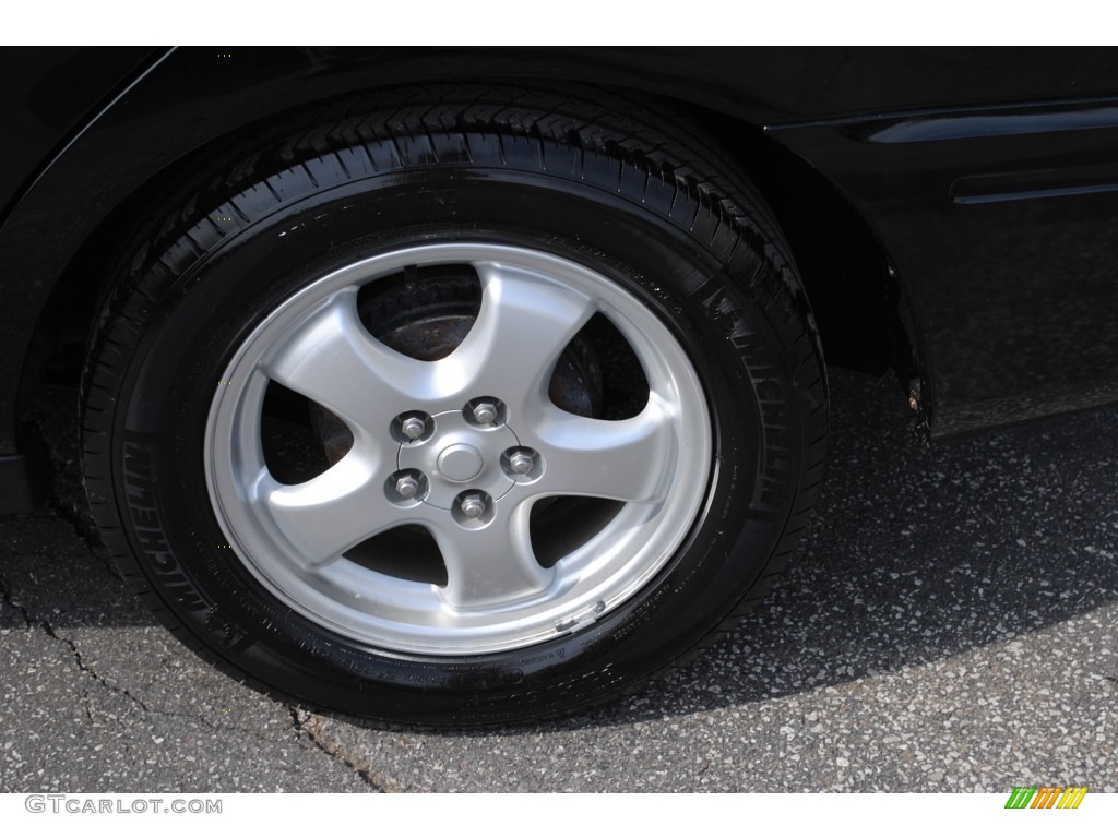 2004 Ford Taurus SES Sedan Wheel Photo #50341902