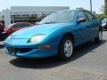 1997 Bright Blue Metallic Pontiac Sunfire SE Sedan  photo #1