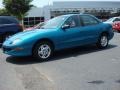 1997 Bright Blue Metallic Pontiac Sunfire SE Sedan  photo #2