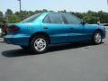 1997 Bright Blue Metallic Pontiac Sunfire SE Sedan  photo #4