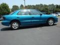 1997 Bright Blue Metallic Pontiac Sunfire SE Sedan  photo #5