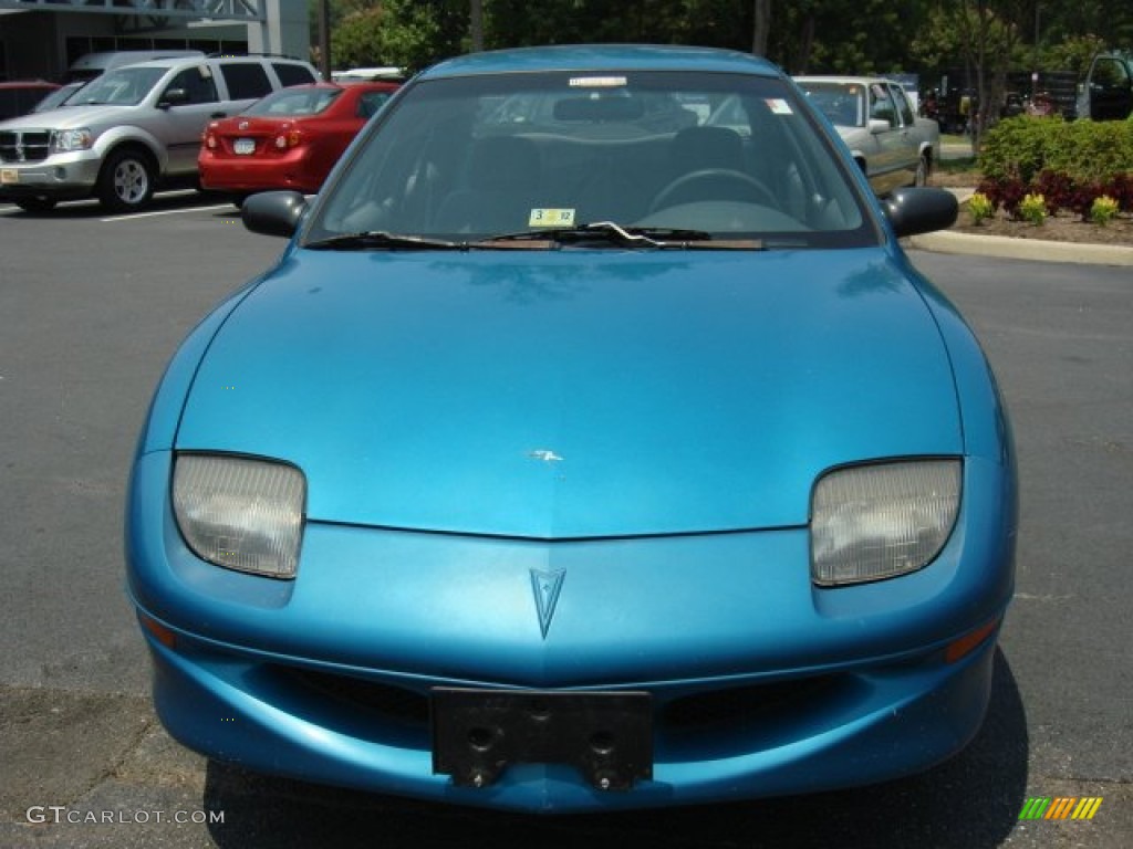 1997 Sunfire SE Sedan - Bright Blue Metallic / Graphite photo #7