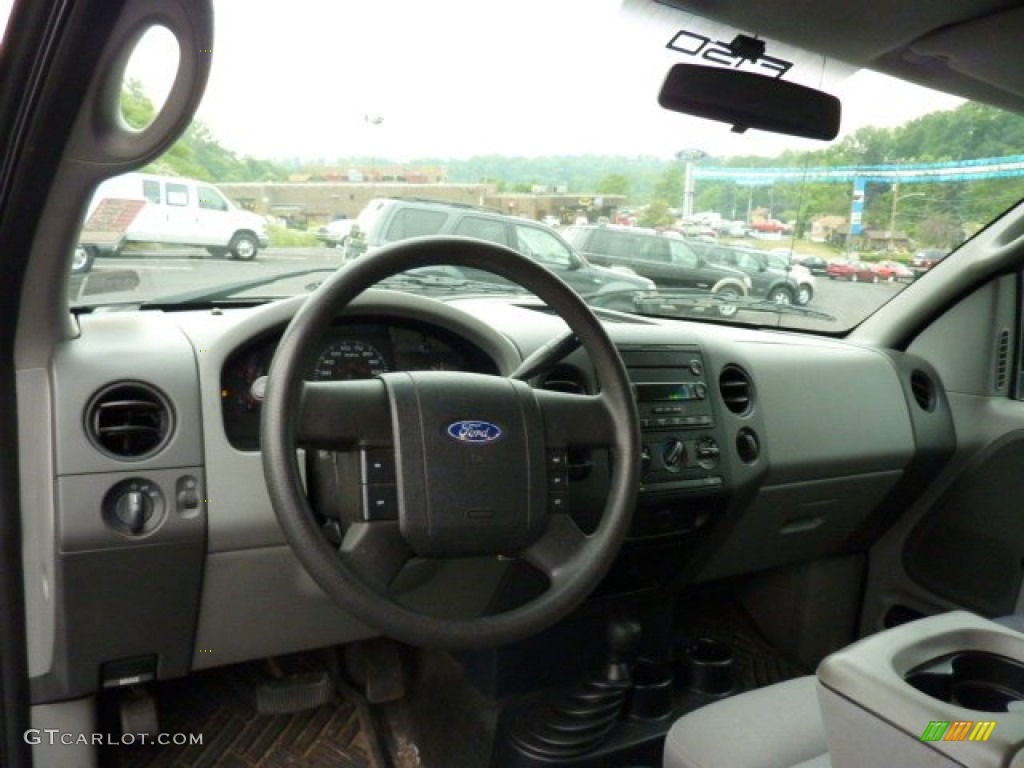 2004 F150 STX SuperCab 4x4 - Black / Black/Medium Flint photo #10