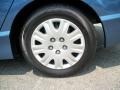 2009 Honda Civic DX-VP Sedan Wheel and Tire Photo