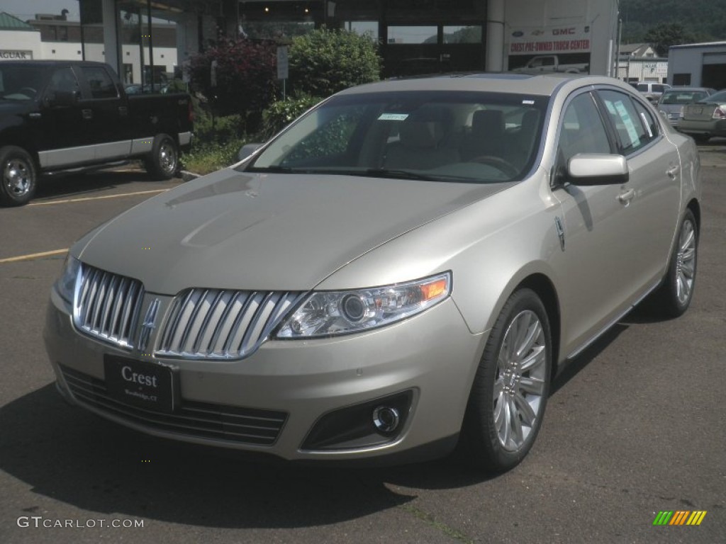 2011 MKS AWD - Gold Leaf Metallic / Light Camel photo #1