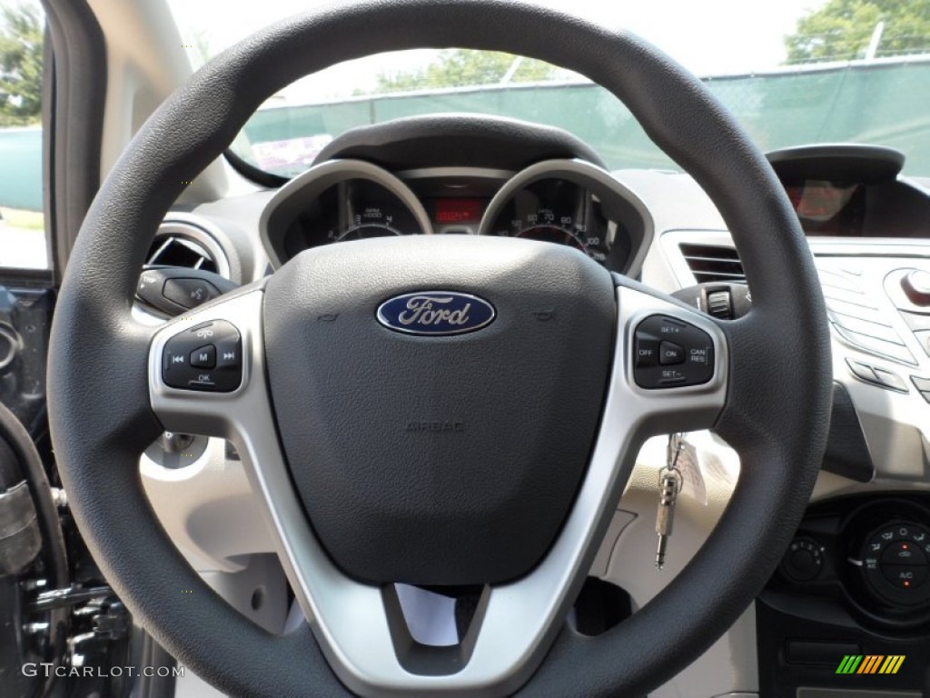 2011 Ford Fiesta SE SFE Sedan Light Stone/Charcoal Black Cloth Steering Wheel Photo #50468239