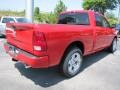 2011 Flame Red Dodge Ram 1500 Sport Quad Cab  photo #3