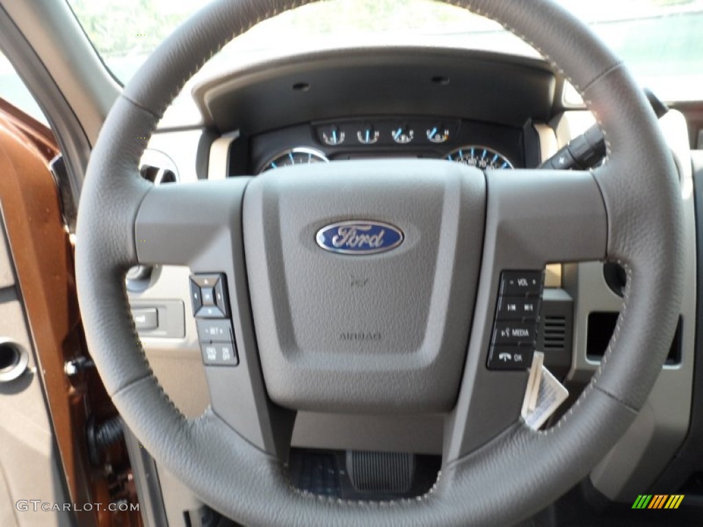 2011 Ford F150 XLT SuperCrew 4x4 Pale Adobe Steering Wheel Photo #50497573