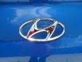2004 Hyundai Tiburon GT Badge and Logo Photo