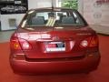 2003 Impulse Red Toyota Corolla CE  photo #7