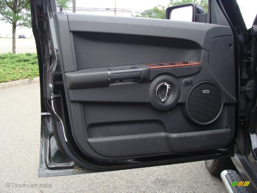 2009 Jeep Commander Limited 4x4 Saddle Brown Door Panel Photo #50531293