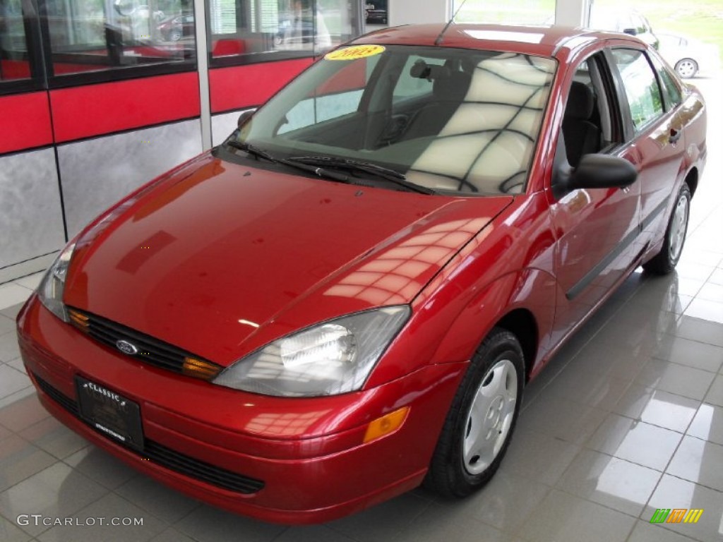 2003 Focus LX Sedan - Sangria Red Metallic / Medium Graphite photo #1