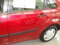 2003 Sangria Red Metallic Ford Focus LX Sedan  photo #4