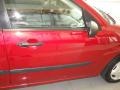 2003 Sangria Red Metallic Ford Focus LX Sedan  photo #9