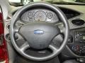 2003 Sangria Red Metallic Ford Focus LX Sedan  photo #22