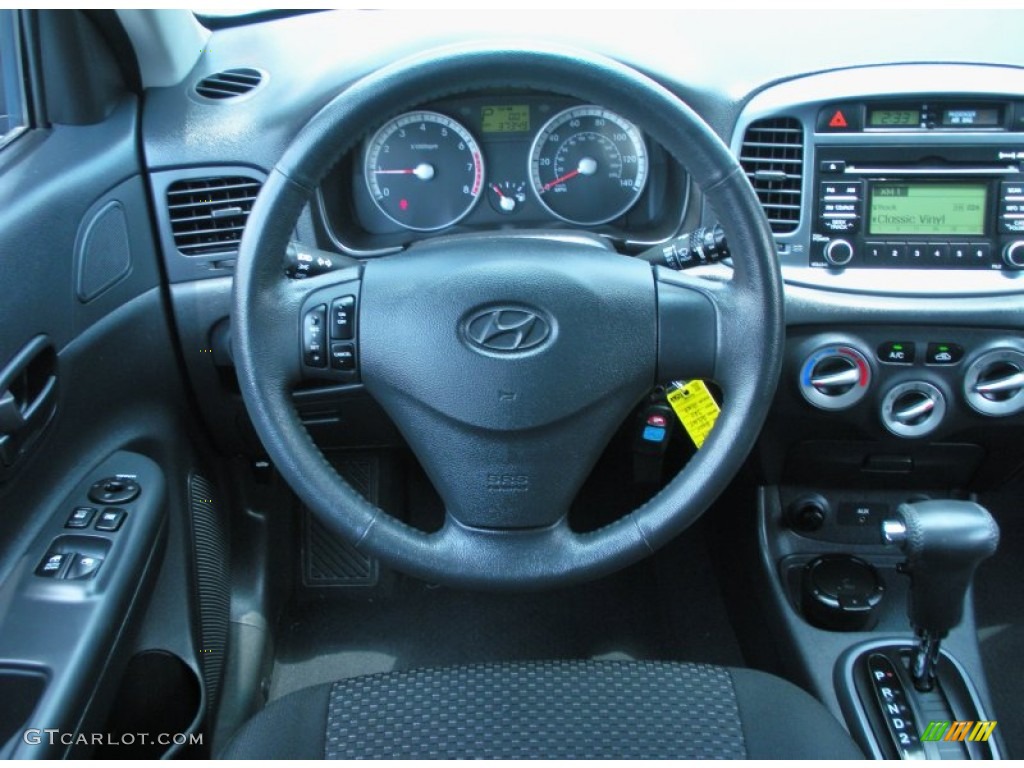 2009 Hyundai Accent SE 3 Door Black Steering Wheel Photo #50552047