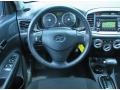 2009 Hyundai Accent Black Interior Steering Wheel Photo