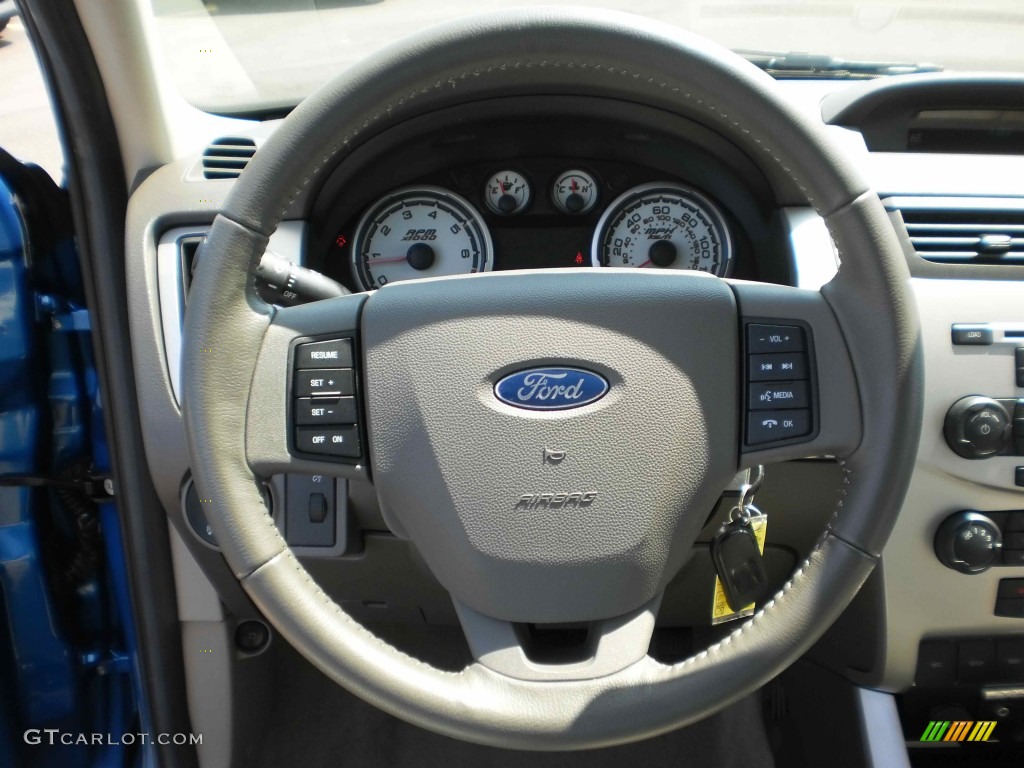 2010 Ford Focus SES Coupe Medium Stone Steering Wheel Photo #50555441