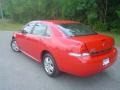 2010 Victory Red Chevrolet Impala LS  photo #9